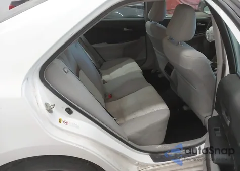 2014 Toyota Camry Le z USA, uszkodzony, nr VIN 4T4BF1FK1ER434046